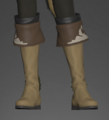 Archaeoskin Boots of Striking front.png